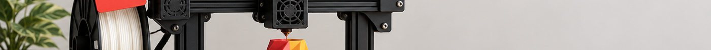 FDM 3D printer mid-print with filament spools, printed figurines and a red half-price tag