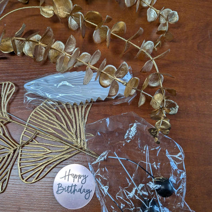 Gold color birthday party decorations leafs