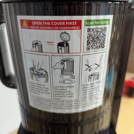Actual unit: AMZCHEF cold press juicer with juicing bowl, food pusher, juice cup and pulp cup
