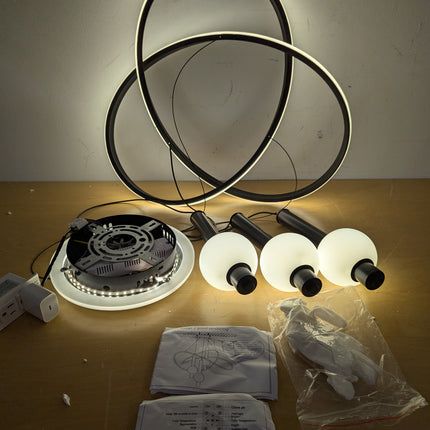 Actual unit: Becailyer LED chandelier rings lit, with globes, canopy, gloves and manuals