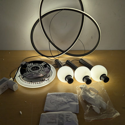 Actual unit: Becailyer LED chandelier rings lit, with globes, canopy, gloves and manuals