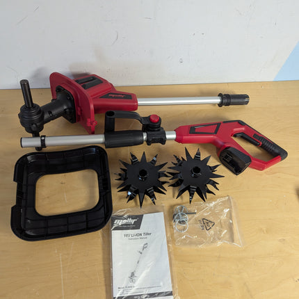 Actual unit: Mellif 18V tiller parts as shipped — shafts, handle, guard, tines, pins, manual