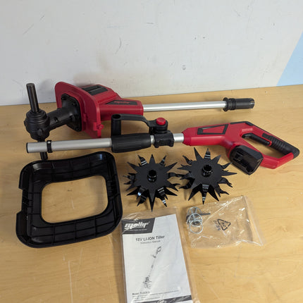 Actual unit: Mellif 18V tiller parts as shipped — shafts, handle, guard, tines, pins, manual