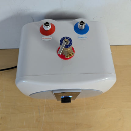 Actual unit: ERFEI water heater inlet, outlet and relief valve from above