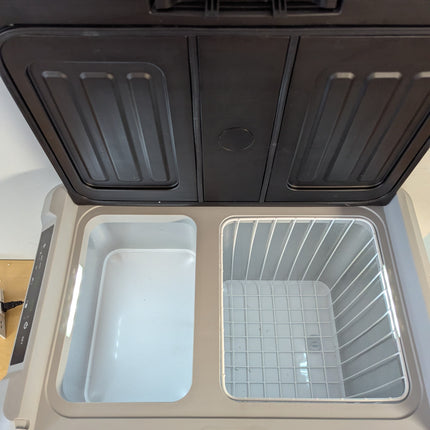 Actual unit: two compartments open, wire basket in the larger zone
