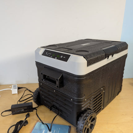 Actual unit: EUHOMY car fridge side view with control panel and wheels