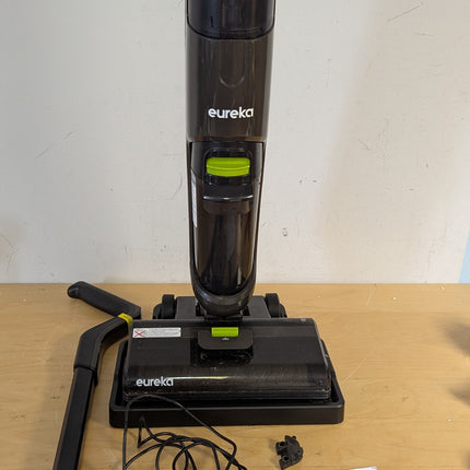 Actual unit: EUREKA NEW400C in its storage tray with handle, charging adapter and owner's guide