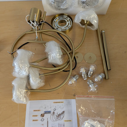 Actual unit: Flyrose chandelier with milk glass globes and bulbs