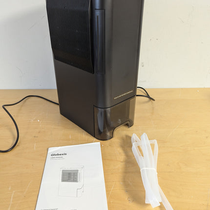 Actual unit: Globexis rotary dehumidifier with drain hose and manual