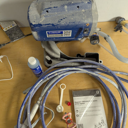 Actual unit: Graco Magnum Project Painter Plus with paint residue