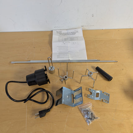 Actual unit: GrillSpot rotisserie kit with motor, spit rod, forks and brackets