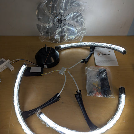 Actual unit: Linboro ceiling fan with LED rings lit, blades and remote in bags