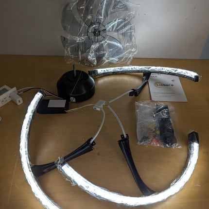Actual unit: Linboro ceiling fan with LED rings lit, blades and remote in bags