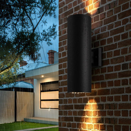 mirrea 18 inch outdoor wall light on a brick wall