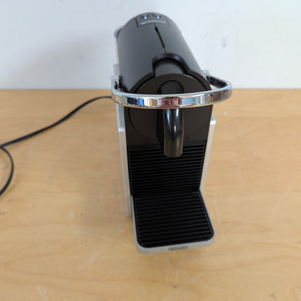 Actual unit: Nespresso Pixie espresso machine by Breville, titan with silver side panels