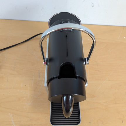 Actual unit: Nespresso Pixie espresso machine by Breville, titan with silver side panels
