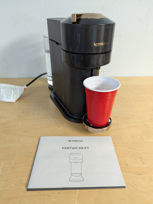 Actual unit: Nespresso Vertuo Next by De'Longhi, black with rose gold