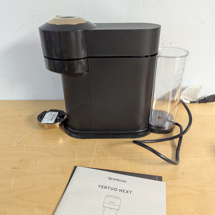 Actual unit: Nespresso Vertuo Next by De'Longhi, black with rose gold