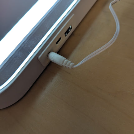 Actual unit: ROLOVE vanity mirror side charging ports and cable
