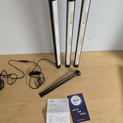 Actual unit: SANSI grow light sections, tripod and manual