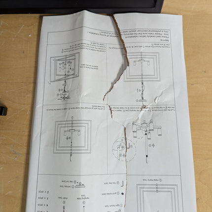 Actual unit: instruction sheet with a tear